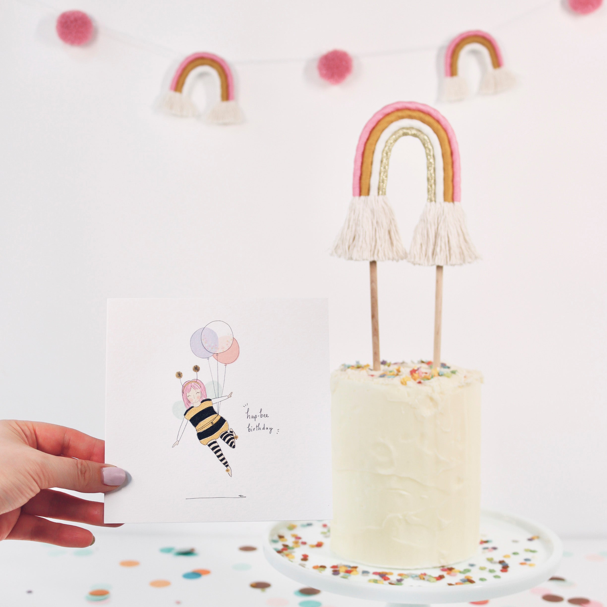 'Eve' rainbow cake topper