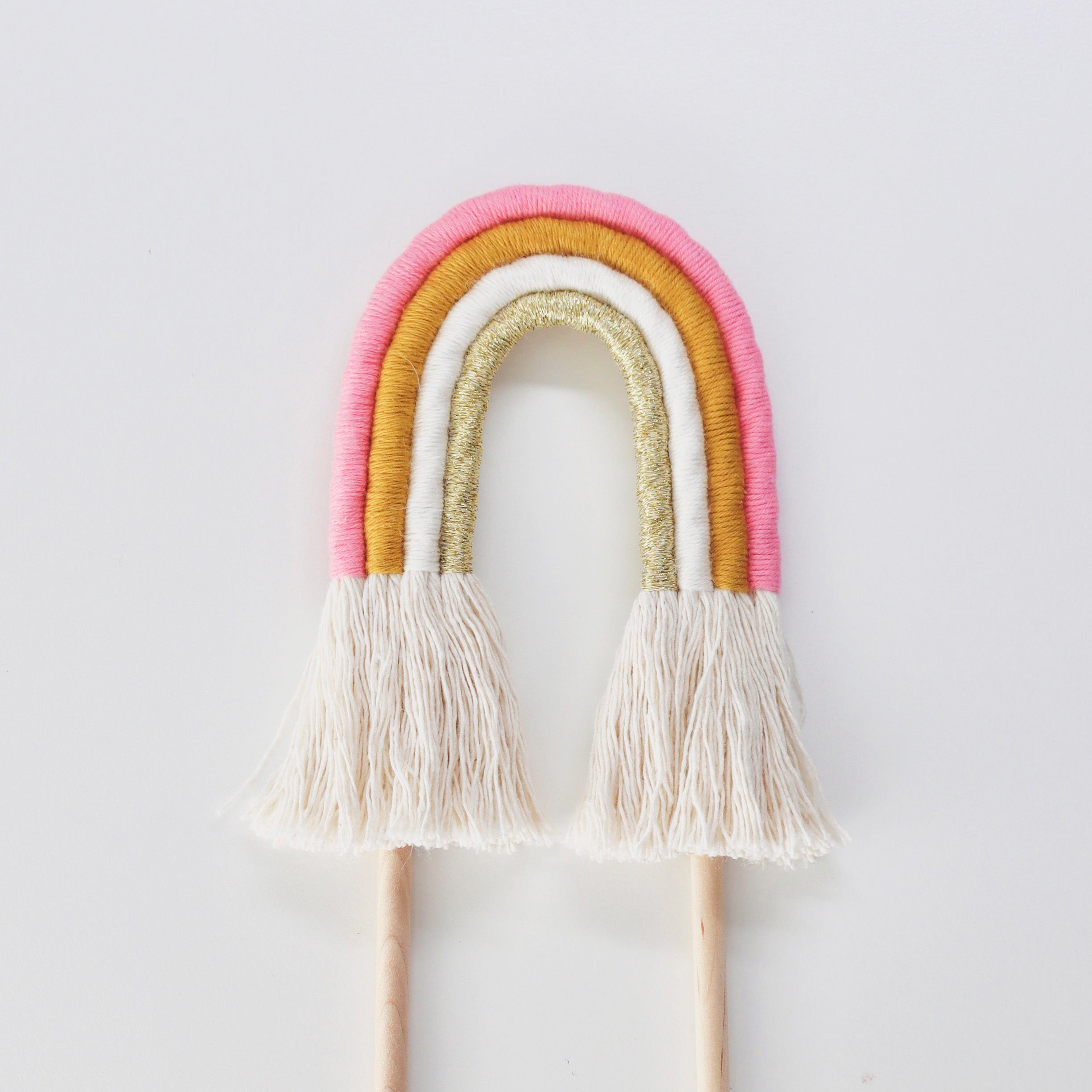 'Eve' rainbow cake topper